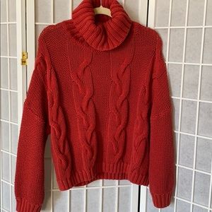 Red turtleneck sweater